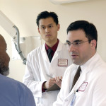 Doctor consults with patient