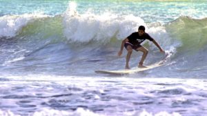 Surfing on Jacó Beach, Costa Rica