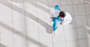 doctor running down hallway