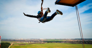rope jumping from cliff platform